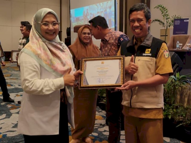 Dinas PU Kota Makassar meraih  peringkat satu OPD terbaik se Sulawesi 2023.