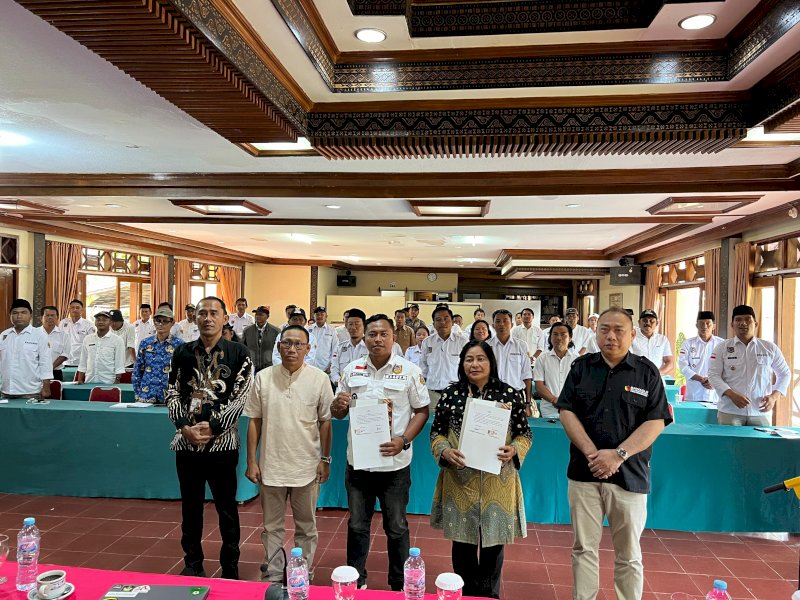 Bawaslu Tator dan APDESI teken MoU berantas politik uang. (Foto: IST)