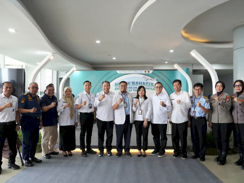 Tim BPJS Kesehatan bersama para petugas lintas lembaga. 