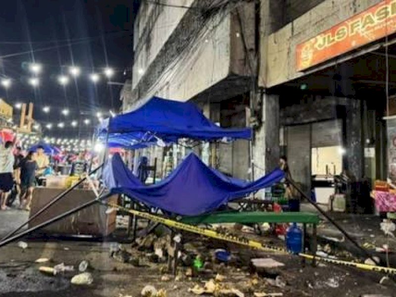 Kota Manila porak-poranda usai diguncang gempa. 