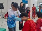 Dukung Eksistensi Olahraga Bela Diri, Kadisporapar Lutra Buka UKT Tapak Suci