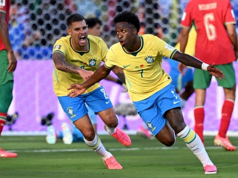 Vinicius melakukan selebrasi usai menjebol gawang Maroko. 