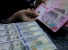 Rupiah Kian Rontok, Kini Sentuh Rp18.091 per Dolar AS 