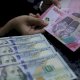 Rupiah Kian Rontok, Kini Sentuh Rp18.091 per Dolar AS 