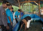 PLN UIP Sulawesi Serahkan Bantuan Konservasi Penangkaran Penyu di Pantai Lentora Donggala