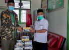 Putus Mata Rantai Covid-19, GP Ansor Toraja Bagi-bagi Masker ke Madrasah