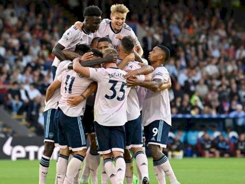 Pemain Arsenal merayakan gol usai membobol gawang Crystal Palace. (int) 
