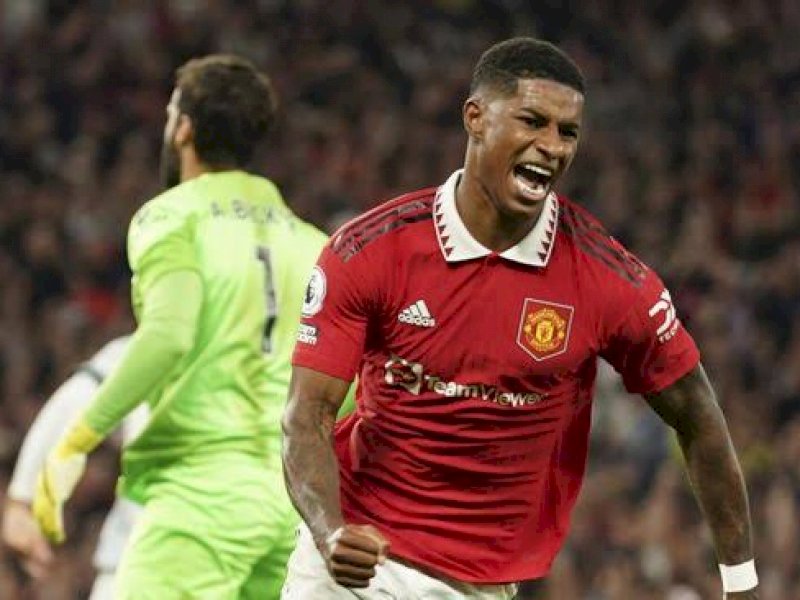 MU menumbangkan Liverpool dengan skor 2-1. (int) 