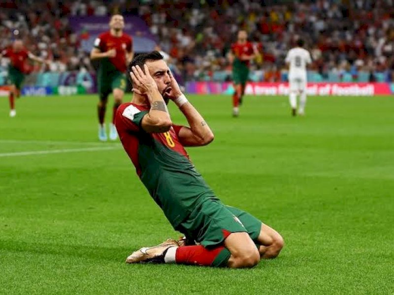 Pemain Portugal melakukan selebrasi usai menjebal gawang Uruguay. (int)
