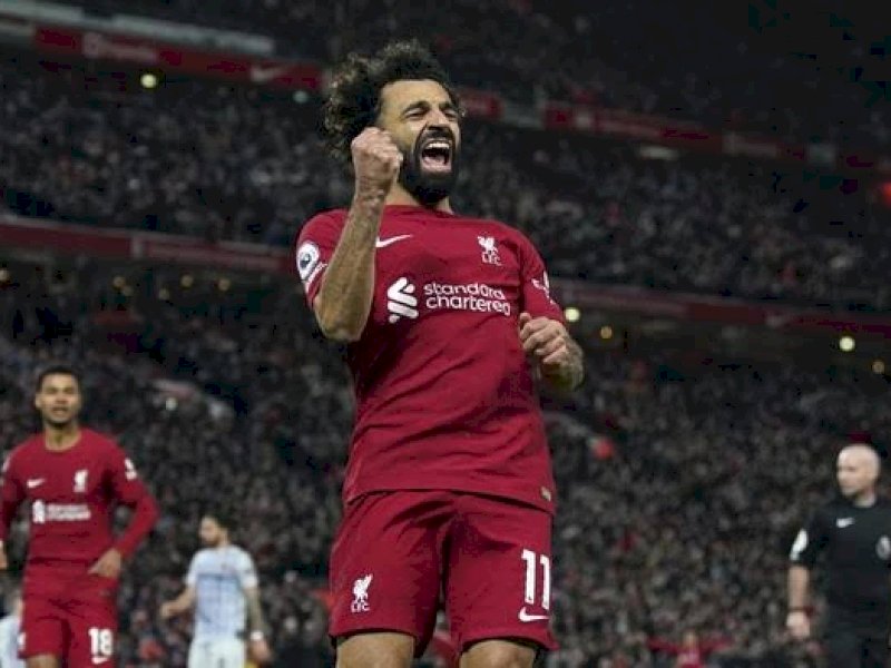 Moh Salah melakukan selebrasi usai menjebol gawang Wolves. (int)