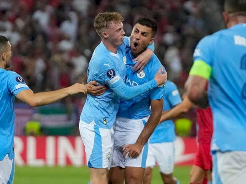 Pemain Manchester City merayakan gol ke gawang Sevilla. (int) 
