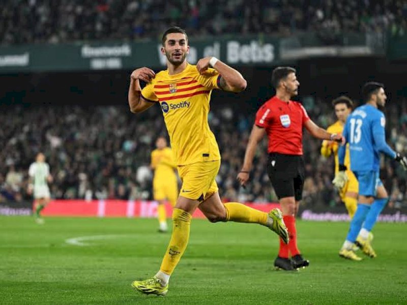 Barcelona menaklukkan Real Betis 4-2. (int) 