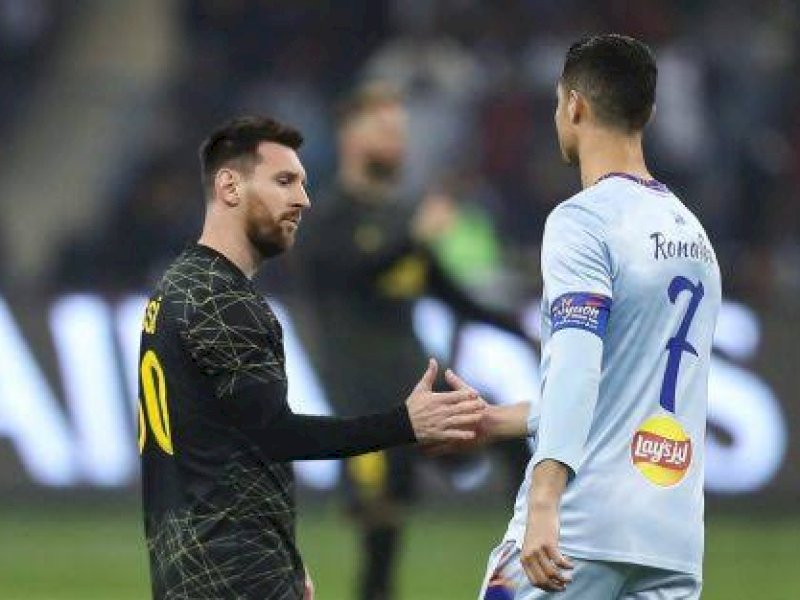Cristiano Ronaldo dan Lionel Messi (int) 