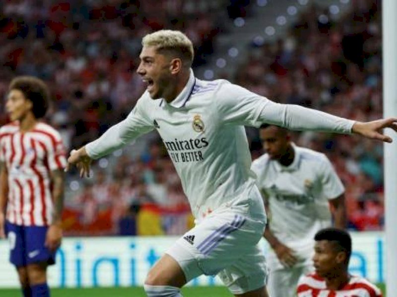 Pemain Real Madrid melakukan selebrasi usai menjebol gawang Atletico Madrid. (int) 