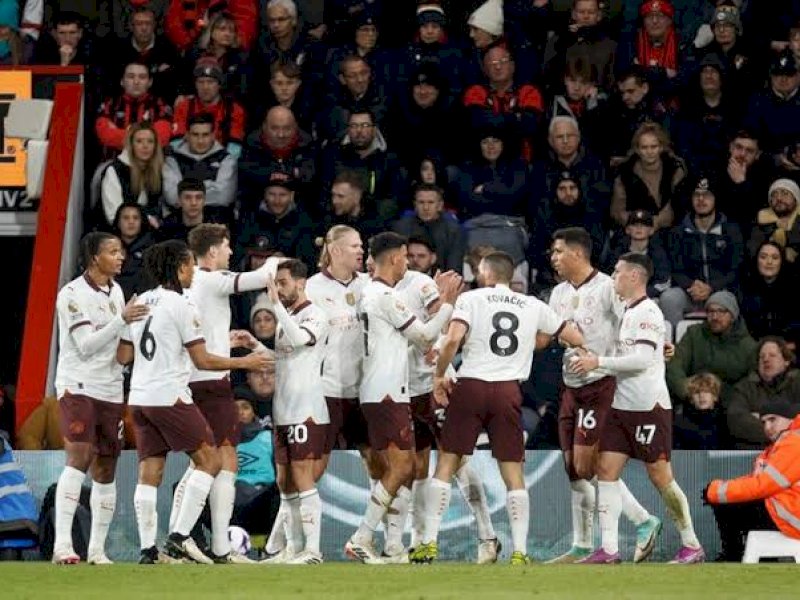 Pemain Manchester City merayakan gol ke gawang Bournemouth. (int) 