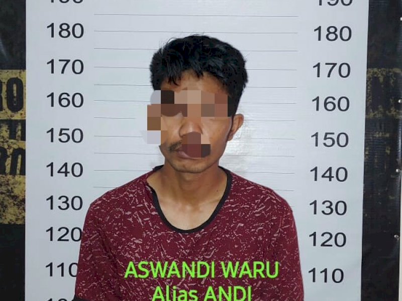 Aswandi Waru (27) saat diamankan di Polsekta Tamalanrea. 