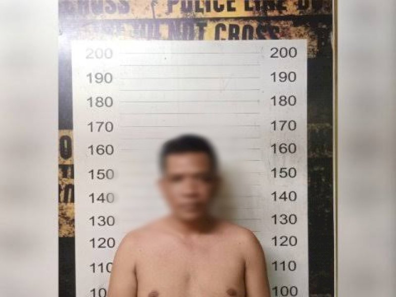 Pelaku diamankan di Polsek Tallo seusai membacok tetangganya. 