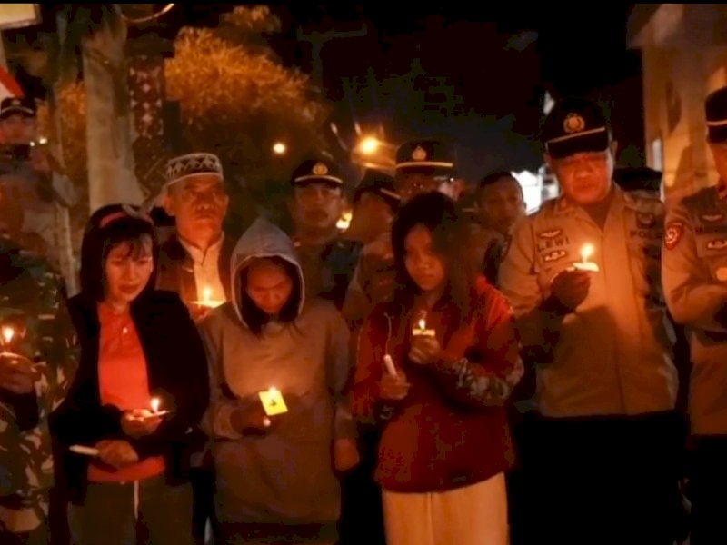 Doa bersama yang digelar Polres Torut bersama masyarakat untuk korban Tragedi Kanjuruhan. 