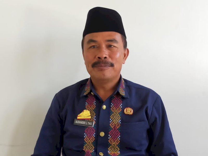 Alexander L Tiku