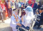 Ini Alya, Siswa Lutra yang Tetap Semangat Ikut Upacara HUT RI Meski di Atas Kursi Roda
