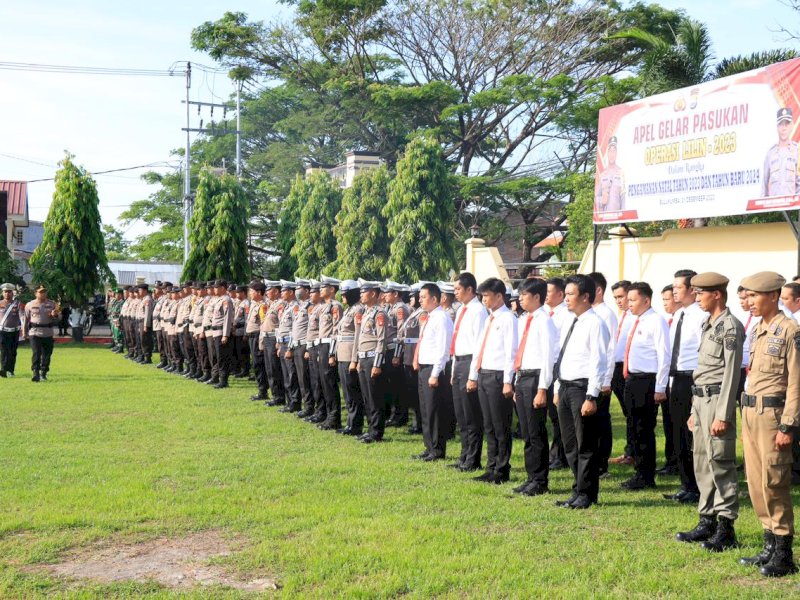 Apel gelar pasukan Operasi Lilin dalam rangka pengamanan Natal 2023 dan Tahun Baru 2024 (Nataru). 