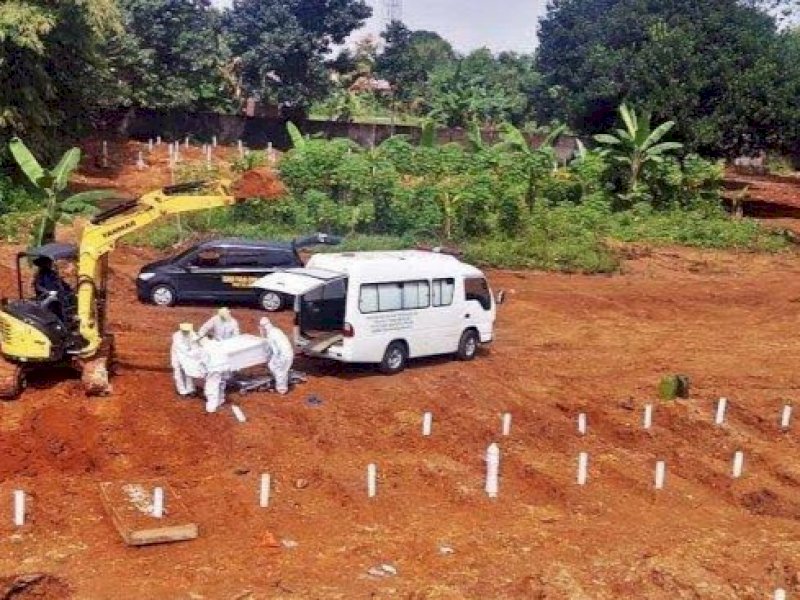 Makam Covid-19. (INT) 