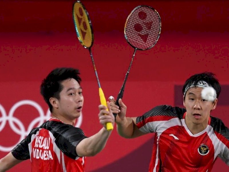 Pasangan Kevin/Marcus tumbang di perempatfinal bulutangkis Olimpiade 2020.(int) 